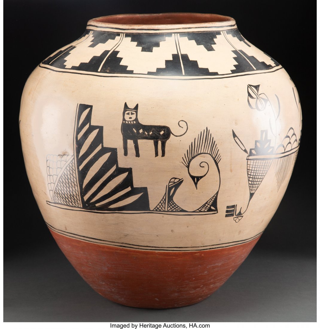 A Large Cochiti Storage Jar c. 1945 clay, pain: A Large Cochiti Storage Jar c. 1945 clay, paint Published: Southern Pueblo Pottery: 2,000 Artist Biographies by Gregory Schaaf, p. 15 Diameter: 20 &frac12; inches HID03101062020 © 2020 Herita