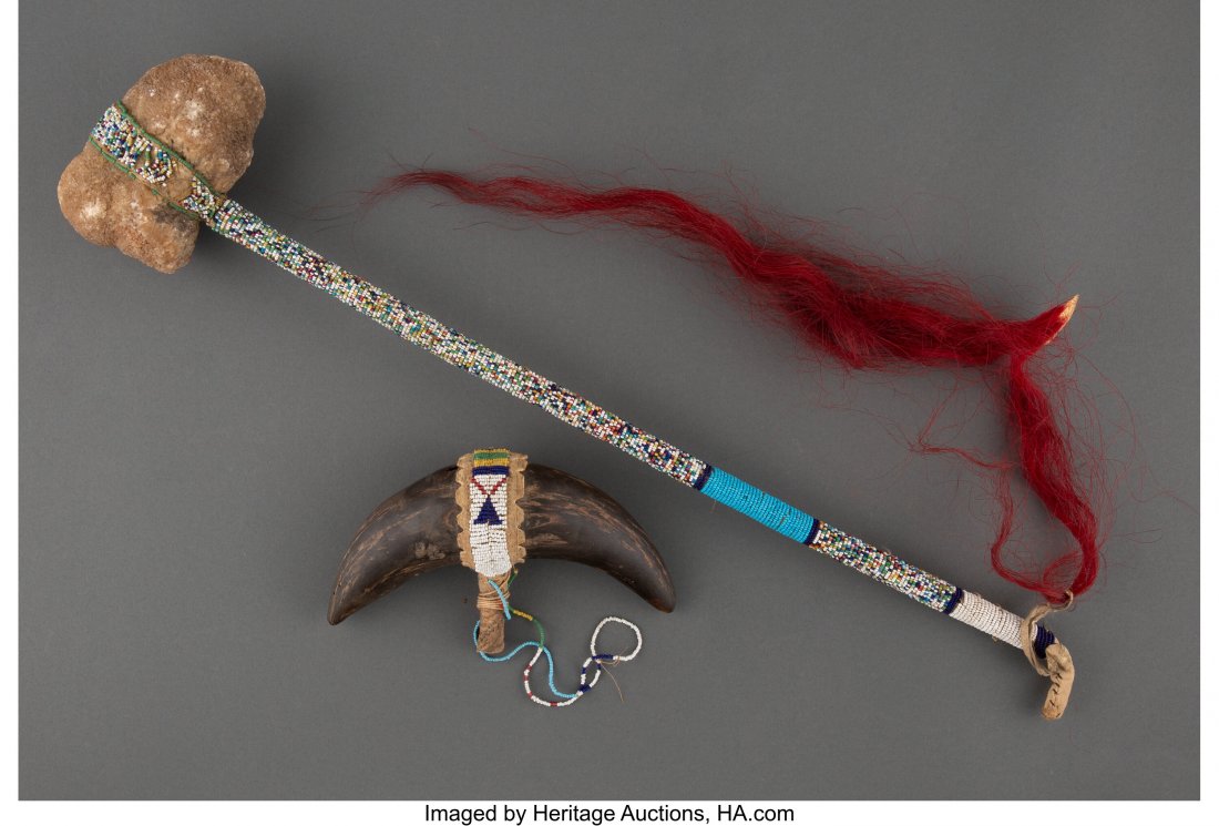 A Sioux Beaded Ceremonial Club c. 1900 togethe: A Sioux Beaded Ceremonial Club c. 1900 together with a buffalo horn club (fragment); quartz, wood, hide, glass seed beads, sinew, dyed horse hair Provenance: From the Valentine Pasvolsky Collection He