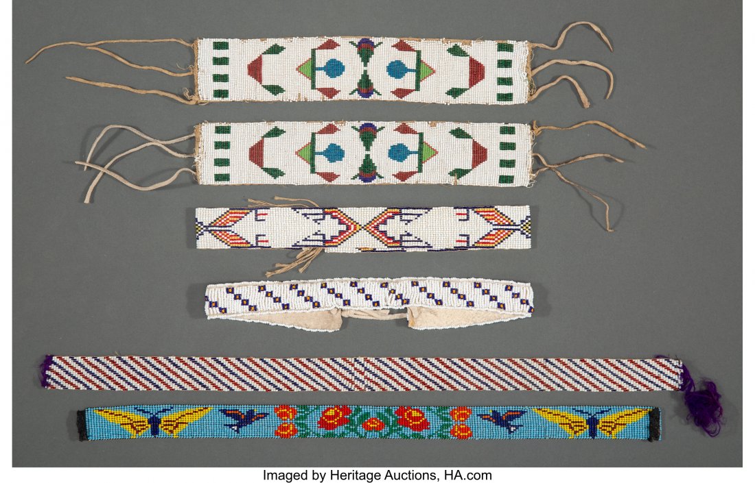 A Pair of Great Lakes Loom-Beaded Armbands c. 1: A Pair of Great Lakes Loom-Beaded Armbands c. 1910 together with two hat bands and two strips, glass seed beads, muslin, hide, silk, cotton thread Provenance: From the L. D. Bax Collection Lengths: 11