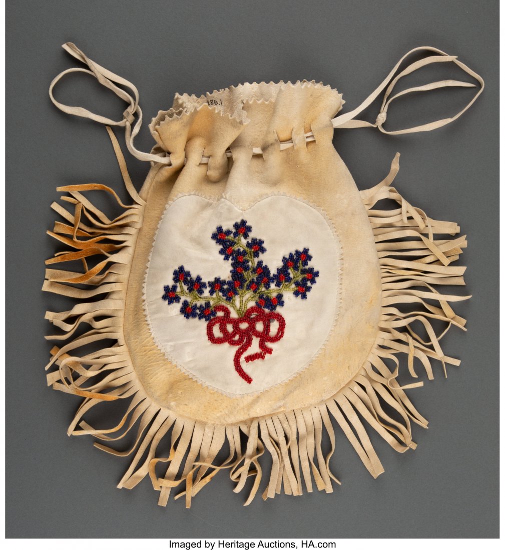 A Cree Beaded Hide Drawstring Pouch Provenance:: A Cree Beaded Hide Drawstring Pouch Provenance: Wistariahurst Museum, Holyoke, MA Length: 13 &frac12; inches overall HID03101062020 © 2020 Heritage Auctions | All Rights Reserved