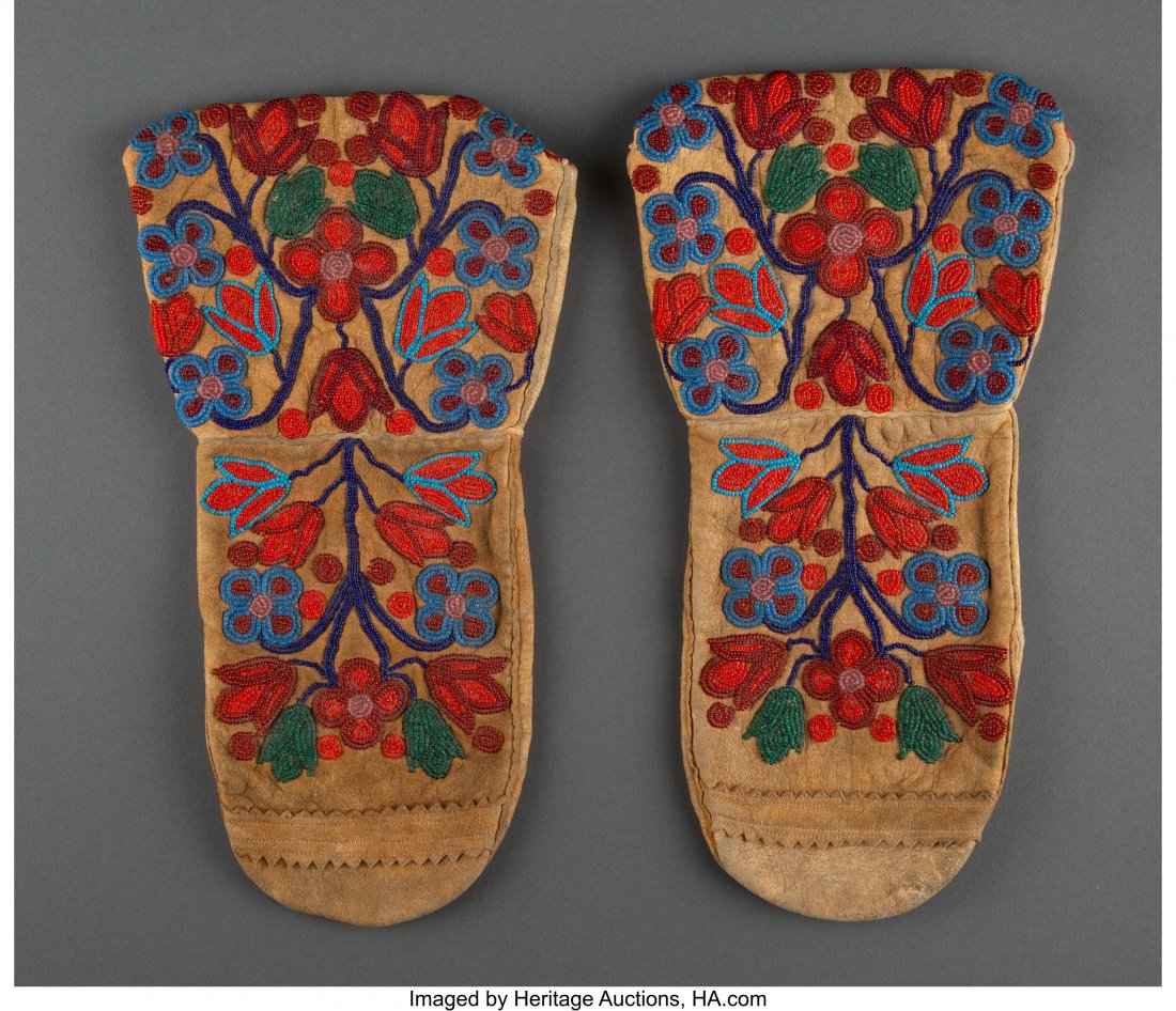 A Pair of Northern Plains Beaded Hide Mittens L: A Pair of Northern Plains Beaded Hide Mittens Lengths: 11 &frac12; inches each HID03101062020 © 2020 Heritage Auctions | All Rights Reserved
