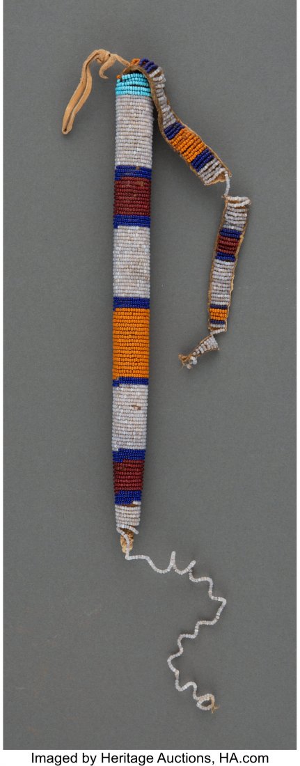 A Sioux Beaded Hide Awl Case Provenance: From t: A Sioux Beaded Hide Awl Case Provenance: From the Valentine Pasvolsky Collection Length: 10 inches HID03101062020 © 2020 Heritage Auctions | All Rights Reserved