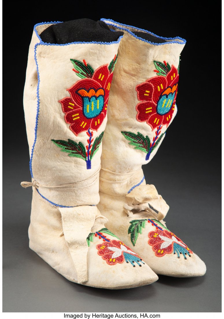 A Pair of Plateau Beaded Hide Moccasins c. 194: A Pair of Plateau Beaded Hide Moccasins c. 1940 Heights: 13 inches each HID03101062020 © 2020 Heritage Auctions | All Rights Reserved