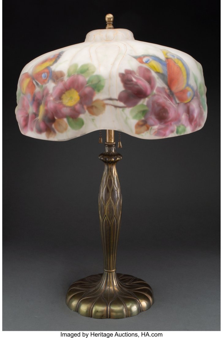 A Pairpoint Reverse-Painted Glass Puffy Lamp on : A Pairpoint Reverse-Painted Glass Puffy Lamp on a Gilt Bronze Base, circa 1920 Marks: (partially effaced) The Pairpoint Company, PAIRPOINT, (diamond-P), C3066 22 x 13-3/4 inches (55.9 x 34.9 cm) HID03