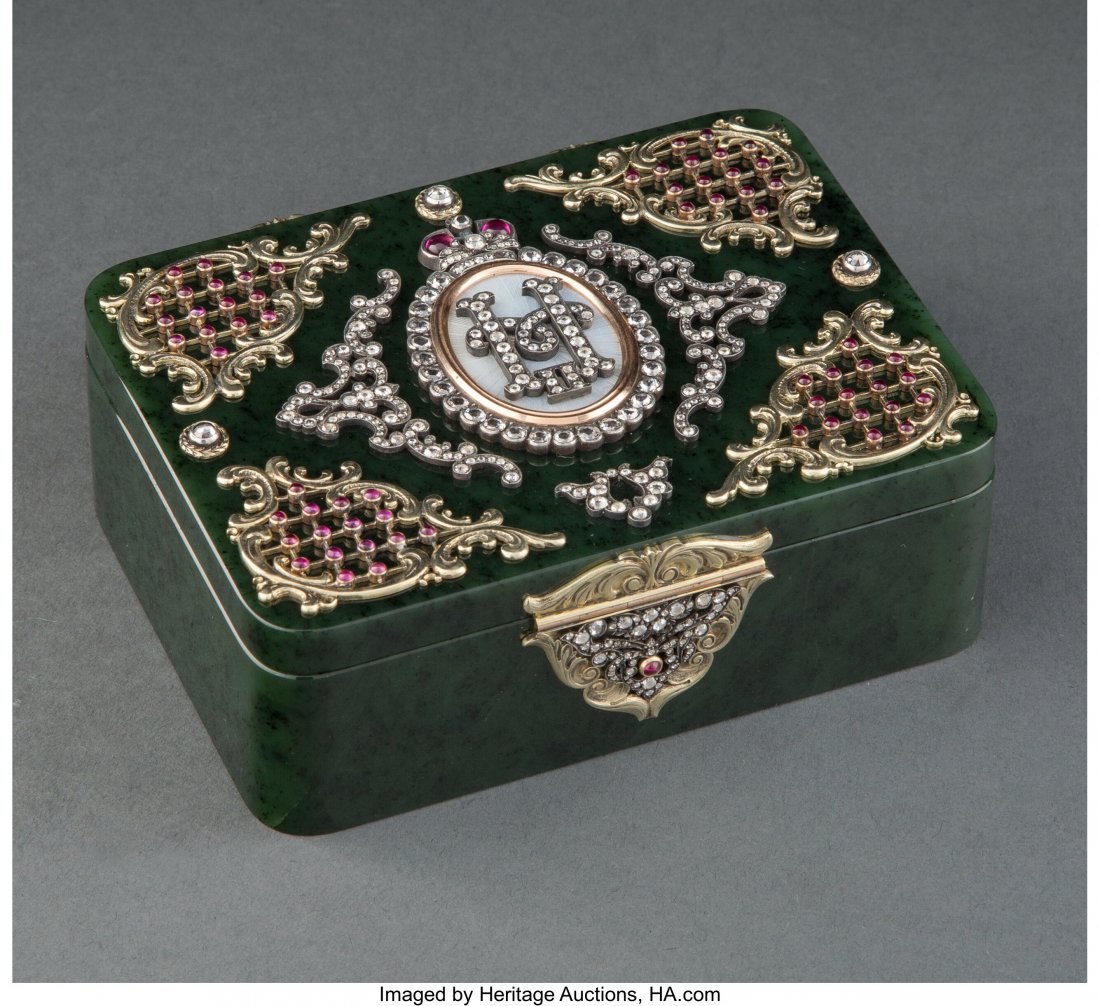 A Spinach Jade, 14K Gold, Diamond, Guilloch�: A Spinach Jade, 14K Gold, Diamond, Guilloché Enamel, and Cabochon-Mounted Box in the Manner of Fabergé, late 20th century 1-1/2 x 4-1/4 x 3-1/8 inches (3.8 x 10.8 x 7.9 cm) Property from