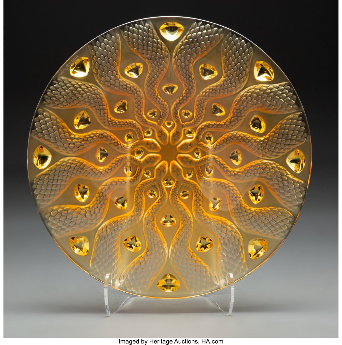 A Lalique Serpents Amber Glass Bowl in Original : A Lalique Serpents Amber Glass Bowl in Original Fitted Box, post-1945 Marks: Lalique®, France, I0288 3-3/8 x 15 inches (8.6 x 38.1 cm) Property from the Dr. David Mehler Collection HID03101062020 