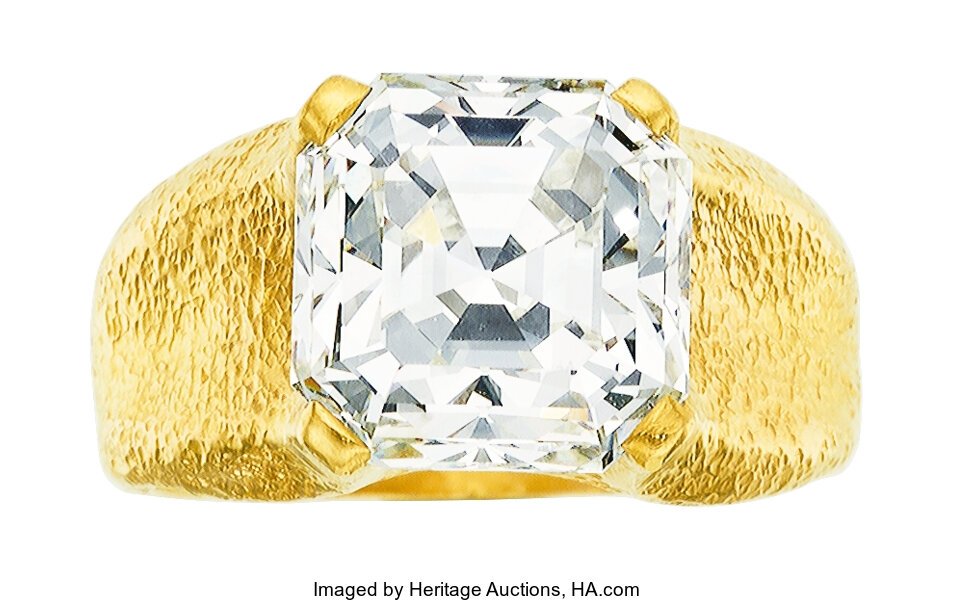 Diamond, Gold Ring, Julius Cohen The ring featu: Diamond, Gold Ring, Julius Cohen The ring features a square emerald-cut diamond measuring 10.32 x 10.21 x 7.59 mm and weighing 6.28 carats, set in 22k gold, marked Julius Cohen. A GIA report # 6217214