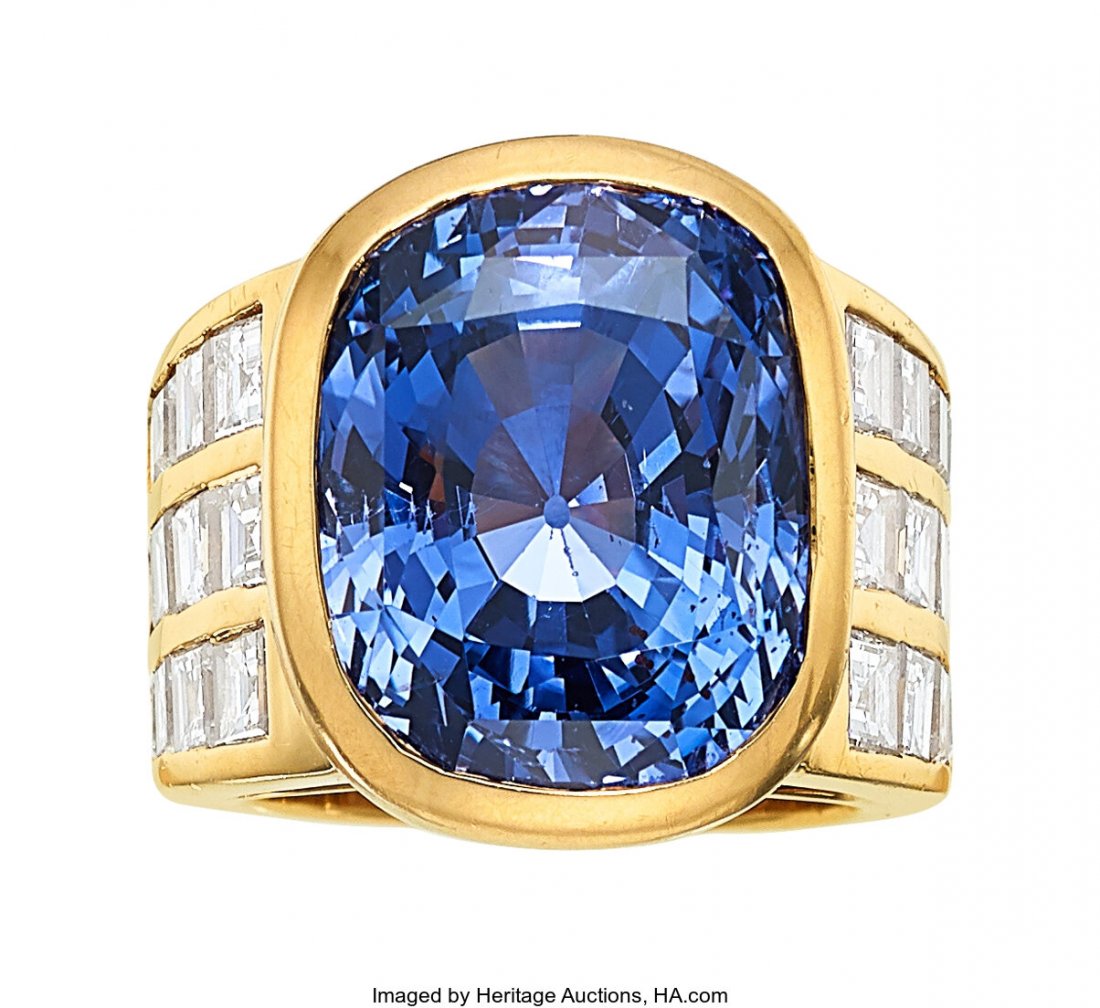 Ceylon Color-Change Sapphire, Diamond, Gold Ring: Ceylon Color-Change Sapphire, Diamond, Gold Ring, Julius Cohen The ring features a cushion-shaped sapphire measuring 16.70 x 13.40 x 12.27 mm and weighing 28.09 carats, enhanced by square step-cut dia