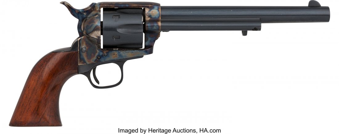 Miniature Uberti Copy of Colt Single Action Army: Miniature Uberti Copy of Colt Single Action Army Revolver. Serial no. 1549 [frame and triggerguard] and 549 [butt], .17 caliber, 3 1/2-inch barrel with fixed front sight and frame notch rear sight. Bl