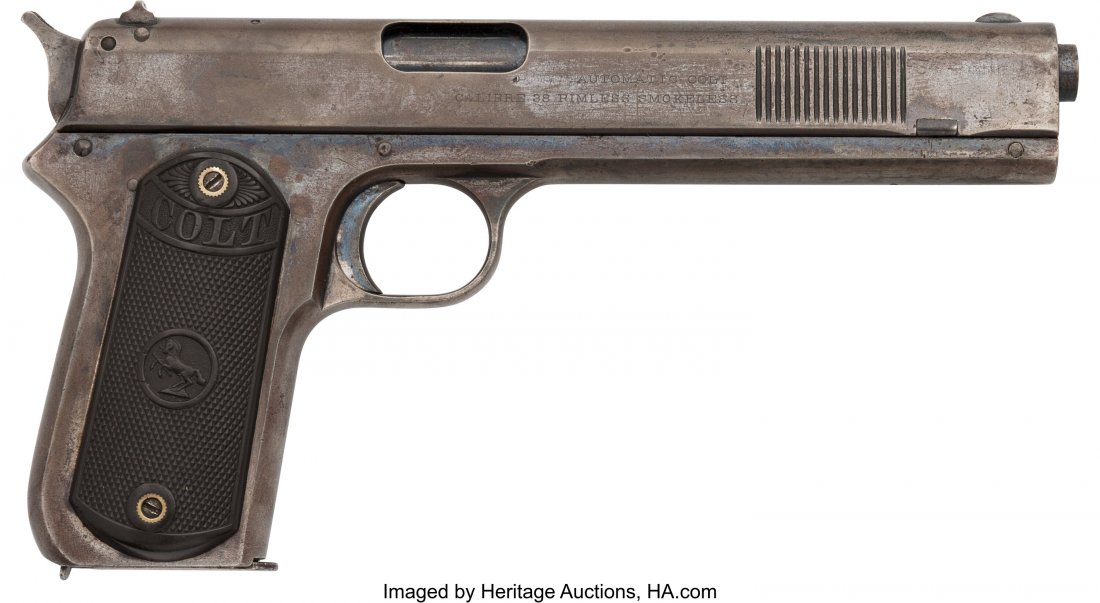 Colt Model 1900 Semi-Automatic Pistol. Serial : Colt Model 1900 Semi-Automatic Pistol. Serial no. 3414, .38 caliber, 6-inch barrel with fixed front and rear sights. Blued finish. Case-hardened hammer and trigger. Rampant Colt logo to left side of s