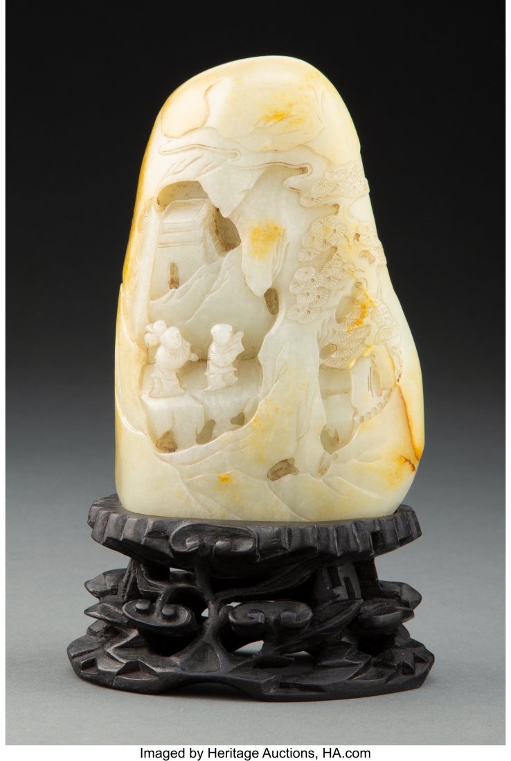 A Chinese Carved Pale Celadon and Russet Jade Mo (1 of 2)