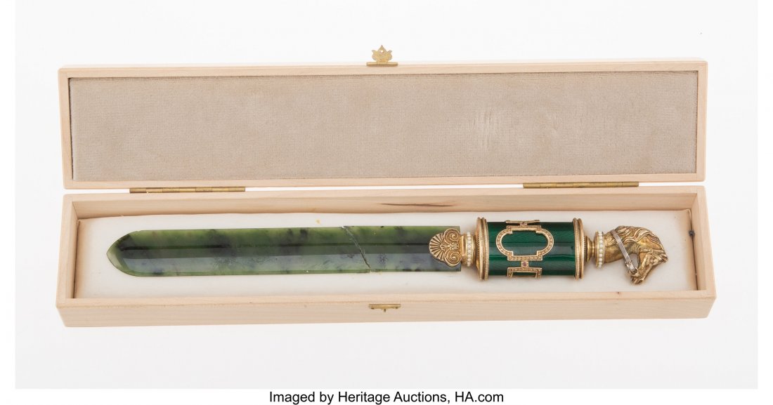 A Spinach Jade, Guilloché Enamel, 14K Var: A Spinach Jade, Guilloché Enamel, 14K Vari-Color Gold, and Cabochon-Mounted Paper Knife in the Manner of Fabergé, late 20th century 9-1/2 x 1-1/4 x 0-3/4 inches (24.1 x 3.2 x 1.9 cm) Property from a