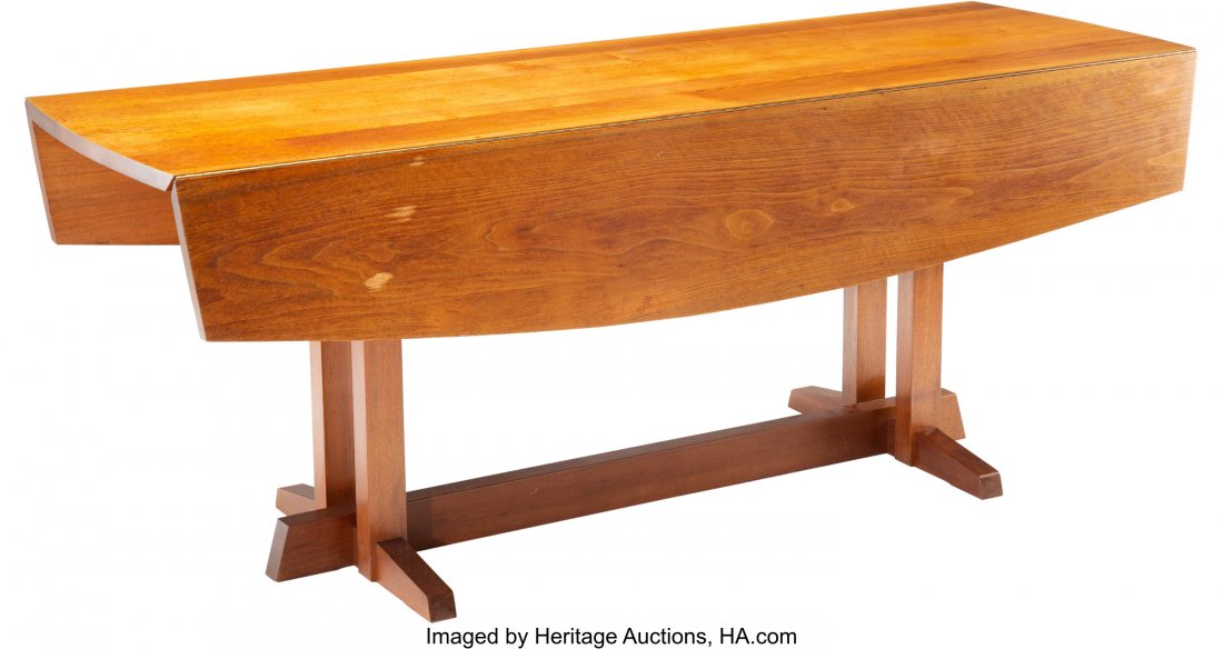 George Nakashima (American, 1905-1990) Frenchman: George Nakashima (American, 1905-1990) Frenchman's Cove II Drop Leaf Table, 1967 Walnut 28-1/2 x 72 x 48 inches (72.4 x 182.9 x 121.9 cm) (open) Sold with scan of original order card PROVENANCE: Georg