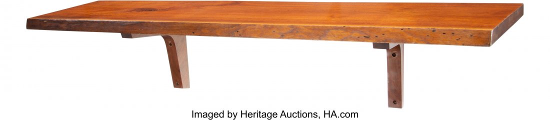 George Nakashima (American, 1905-1990) Wall-moun: George Nakashima (American, 1905-1990) Wall-mounted Shelf, circa 1975 Black walnut 13-1/4 x 60 x 16-3/4 inches (33.7 x 152.4 x 42.5 cm) HID03101062020 © 2020 Heritage Auctions | All Rights Reserv