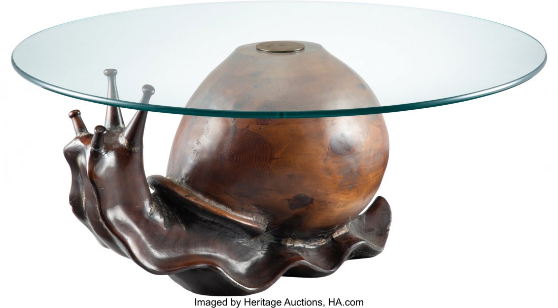 Attributed to Federico Armijo (American, b. 1946: Attributed to Federico Armijo (American, b. 1946) Snail Table, circa 1970 Pine, glass, brass 18-1/2 x 26 x 15 inches (47.0 x 66.0 x 38.1 cm) (base) 40 inches (101.6 cm) (tabletop) HID03101062020 ©