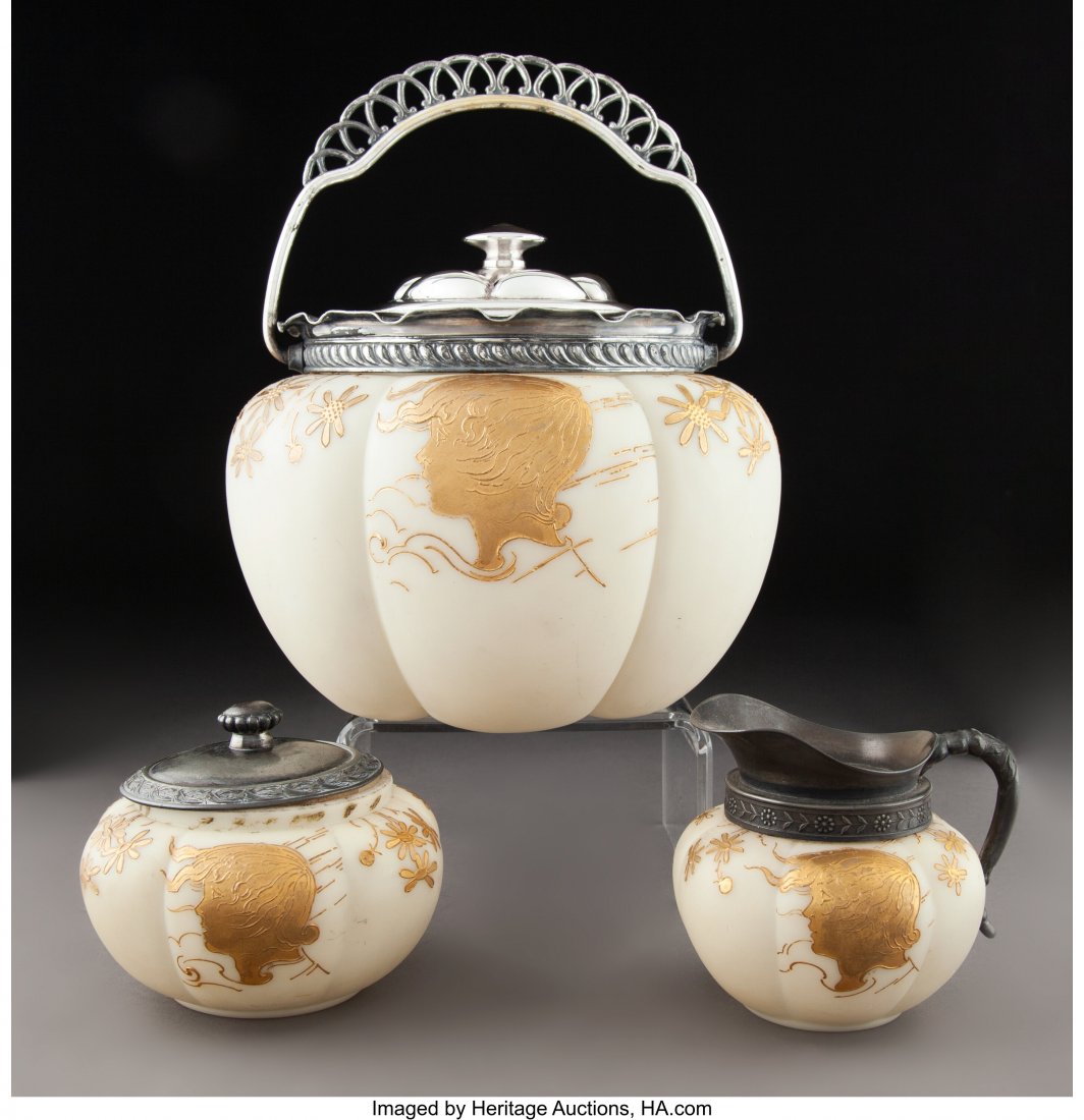 Three Mt. Washington for Smith Brothers Metal-Mo: Three Mt. Washington for Smith Brothers Metal-Mounted and Partial Gilt Ivory Glass Vessels, circa 1890 Marks: (lion rampant in shield), TRADEMARK 6 inches (15.2 cm) (tallest, biscuit jar) PROPERTY FRO