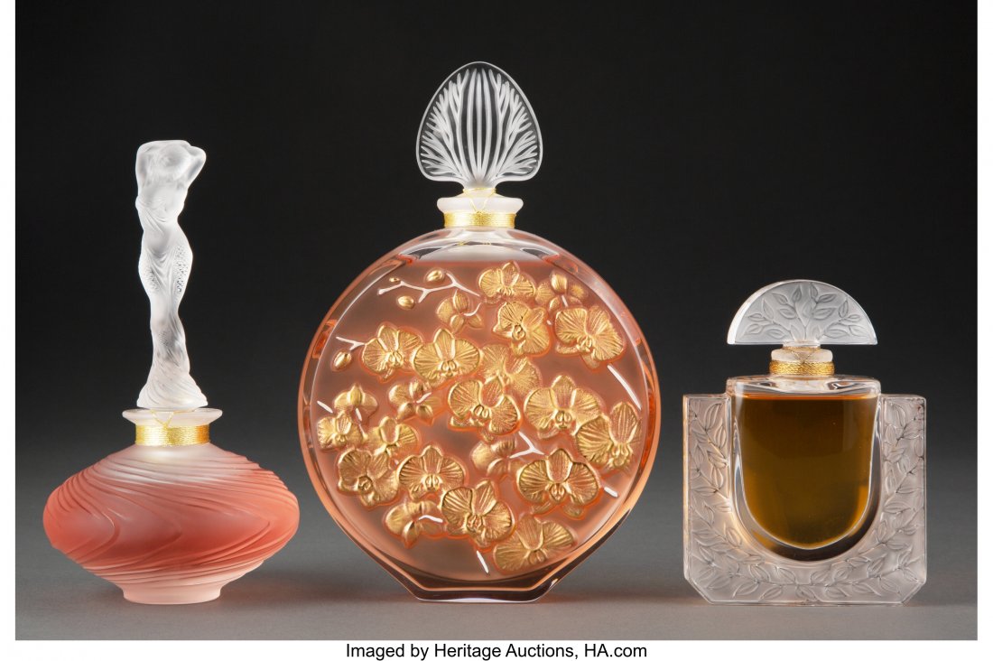 Three Lalique Clear and Frosted Glass Perfume Bo: Three Lalique Clear and Frosted Glass Perfume Bottles with Original Boxes, France, 2019-2020 Marks: Lalique®France, (various) 6-1/2 inches (16.5 cm) (2019 Flacon Limited Edition, excluding box) Th