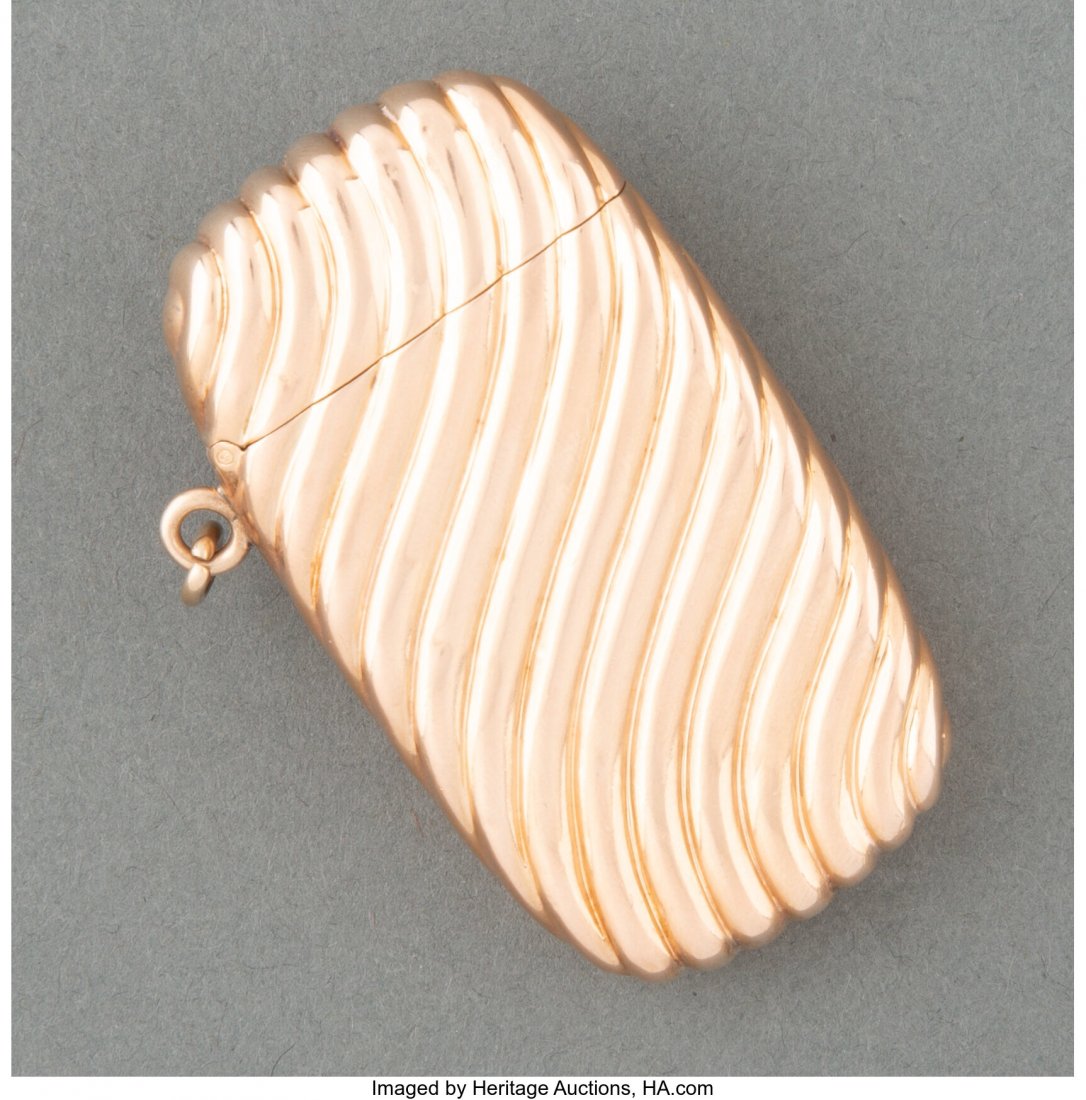 A Carter, Howe & Co. 14K Gold Match Safe, Newark: A Carter, Howe & Co. 14K Gold Match Safe, Newark, New Jersey, circa 1890 Marks: (C-arrow), 14K 2-1/2 x 1-3/8 x 0-3/8 inches (6.4 x 3.5 x 1.0 cm) 0.82 troy ounces Property from the Estate of John O