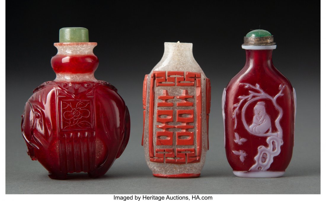 A Group of Three Chinese Carved Glass Snuff Bott (1 of 2)