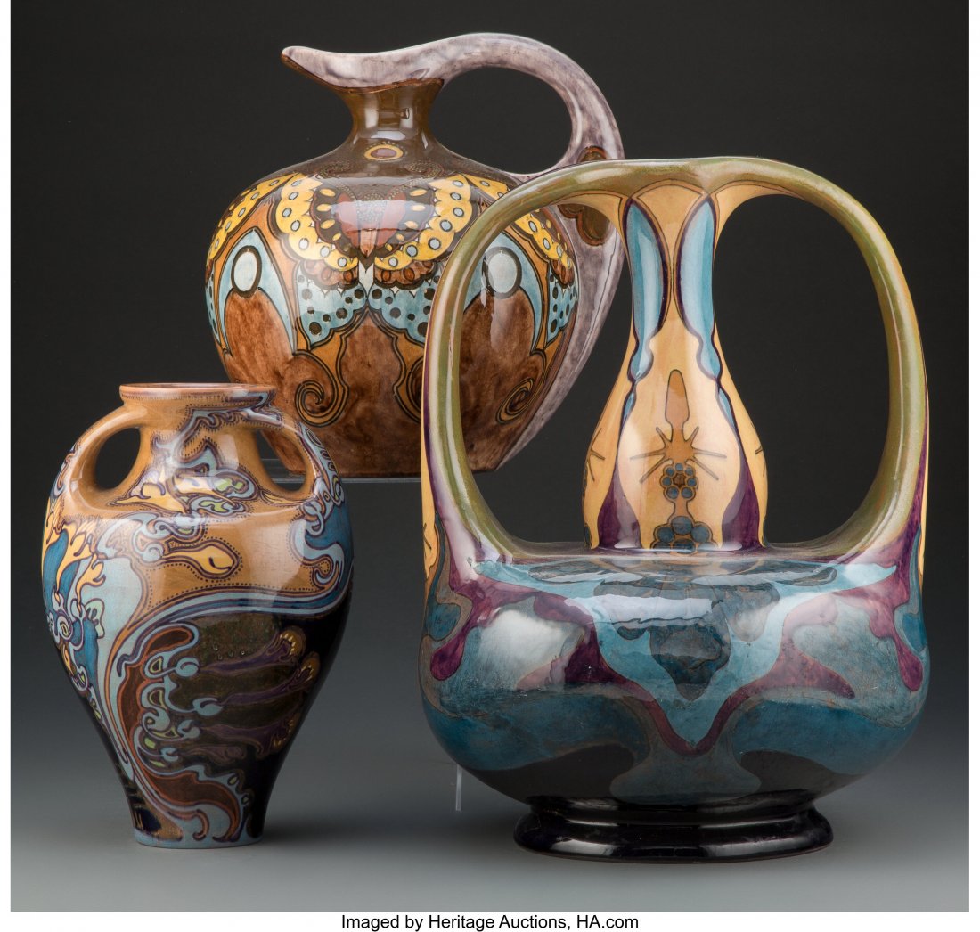 Three Rozenburg Earthenware Vessels, circa 1900 : Three Rozenburg Earthenware Vessels, circa 1900 Marks: Rozenburg, (stork), den Haag, (date mark), (various) 16 x 12 x 12 inches (40.6 x 30.5 x 30.5 cm) (tallest) HID03101062020 © 2020 Heritage Au