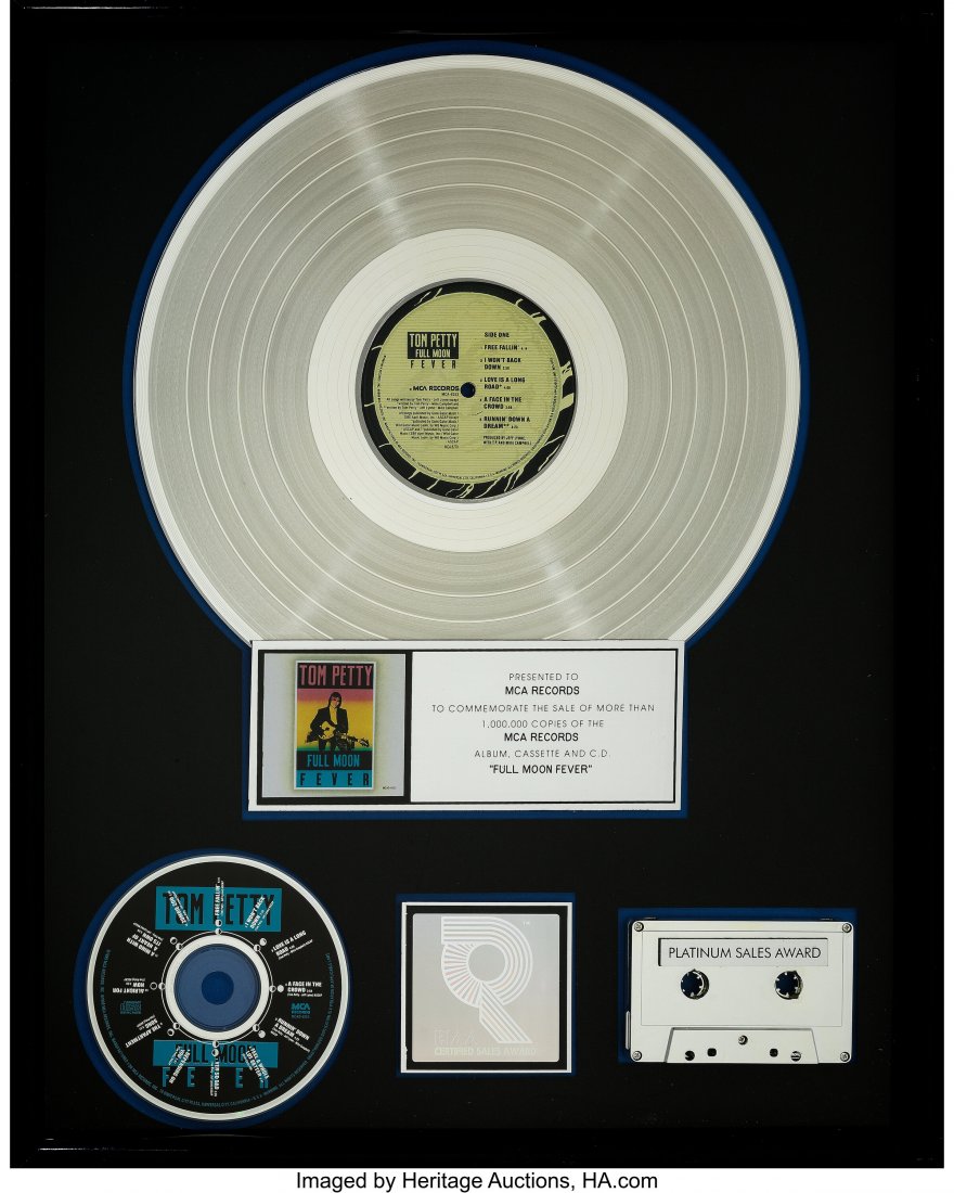 Tom Petty Full Moon Fever RIAA R Hologram Platin: Tom Petty Full Moon Fever RIAA R Hologram Platinum Sales Award. An award for Tom Petty's first solo album, produced by Jeff Lynne, giving the world the legendary singles, "Free Fallin'," "I Won't Back