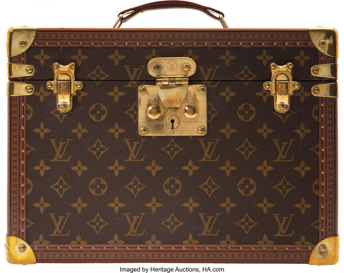 Louis Vuitton Monogram Coated Canvas Beauty Case: Louis Vuitton Monogram Coated Canvas Beauty Case Trunk Condition: 4 14" Width x 10" Height x 8" Depth This trunk is done in monogram coated canvas with brass hardware, featuring a top handle and three