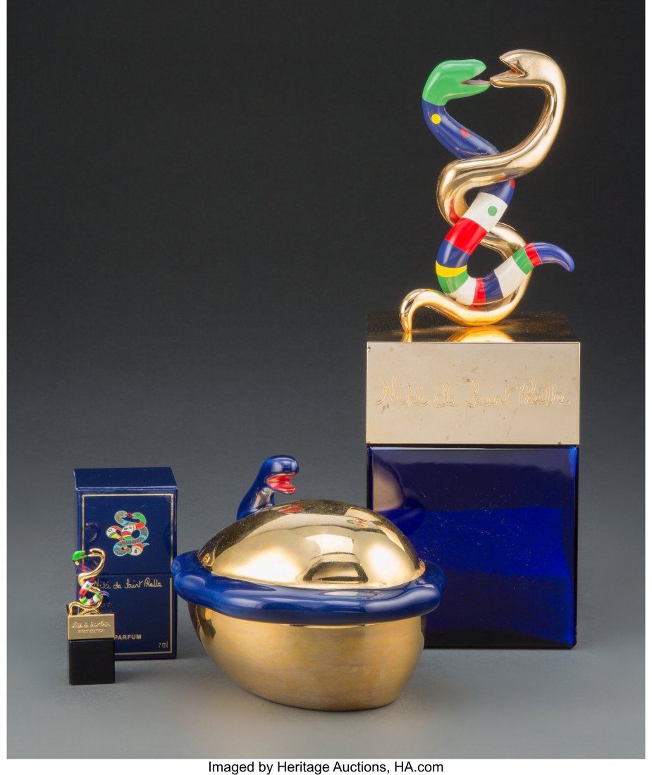 Three Niki de Saint Phalle Perfume Articles, cir: Three Niki de Saint Phalle Perfume Articles, circa 1980 14-1/4 x 5 x 5 inches (36.2 x 12.7 x 12.7 cm) (largest, Factice Géant du Parfum box) The lot comprising: 1 Niki de Saint Phalle ceramic S
