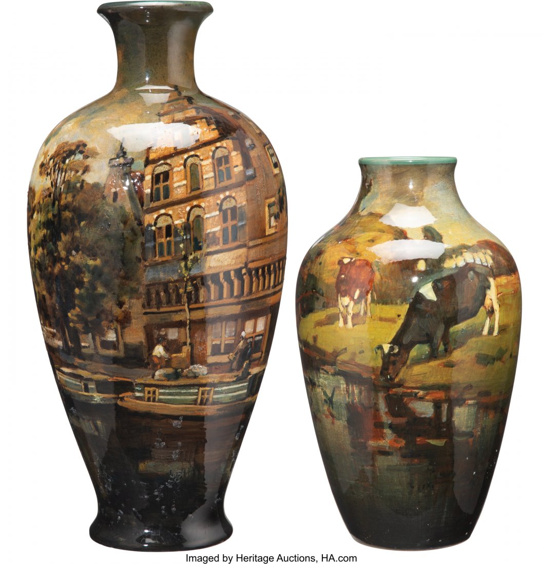 Two Gouda Earthenware Cityscape Vases, Holland,: Two Gouda Earthenware Cityscape Vases, Holland, early 20th century Marks: PAŸSAGE, (building), HOLLAND, Huizen uit de (effaced) Alkmaar 17-1/2 x 8-1/2 inches (44.5 x 21.6 cm) (tallest) Marks to s