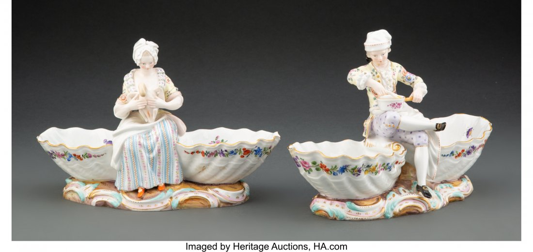 A Pair of Meissen Porcelain Figural Sweetmeats,: A Pair of Meissen Porcelain Figural Sweetmeats, late 19th-early 20th century Marks: (crossed swords in underglaze blue), (various) 7-1/4 x 10 x 4-1/8 inches (18.4 x 25.4 x 10.5 cm) (each, approximatel