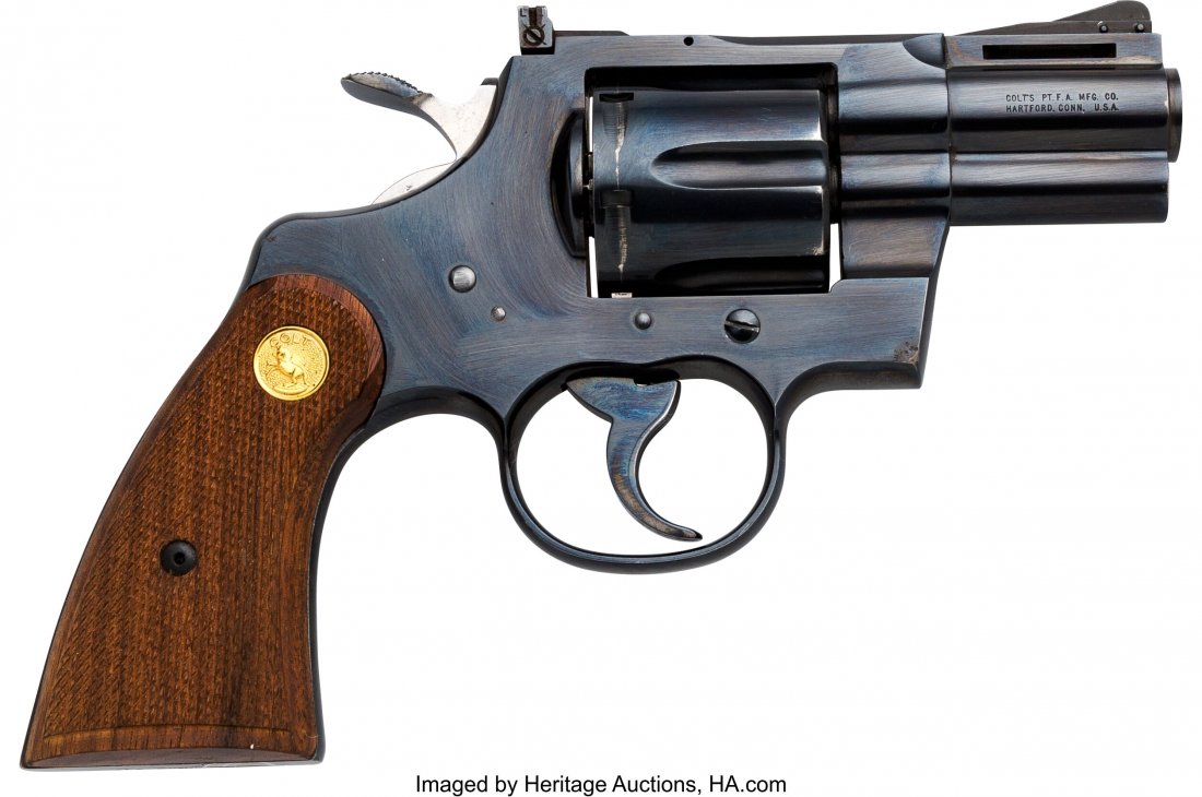 Early Colt Python Model Double Action Revolver.: Early Colt Python Model Double Action Revolver. Serial no. 27666 [frame and crane], .357 Magnum caliber, 2 1/2-inch barrel with ventilated rib, fixed front sight and micrometer adjust rear sight. Blue