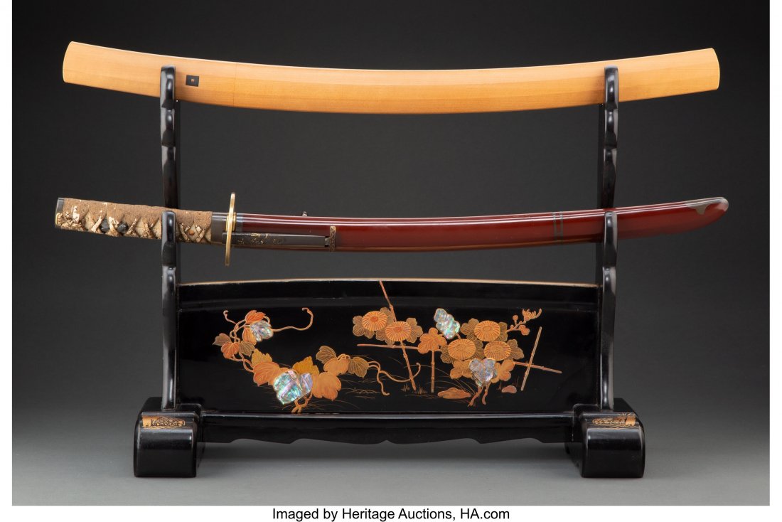A Japanese TantÅ Sword with Bokken and Lacquere: A Japanese TantÅ Sword with Bokken and Lacquered Stand Marks: (cipher) 25 x 2-3/4 x 2-3/4 inches (63.5 x 7.0 x 7.0 cm) The tantÅ with shagreen sami and embroidered silk cord wrap and silver bees