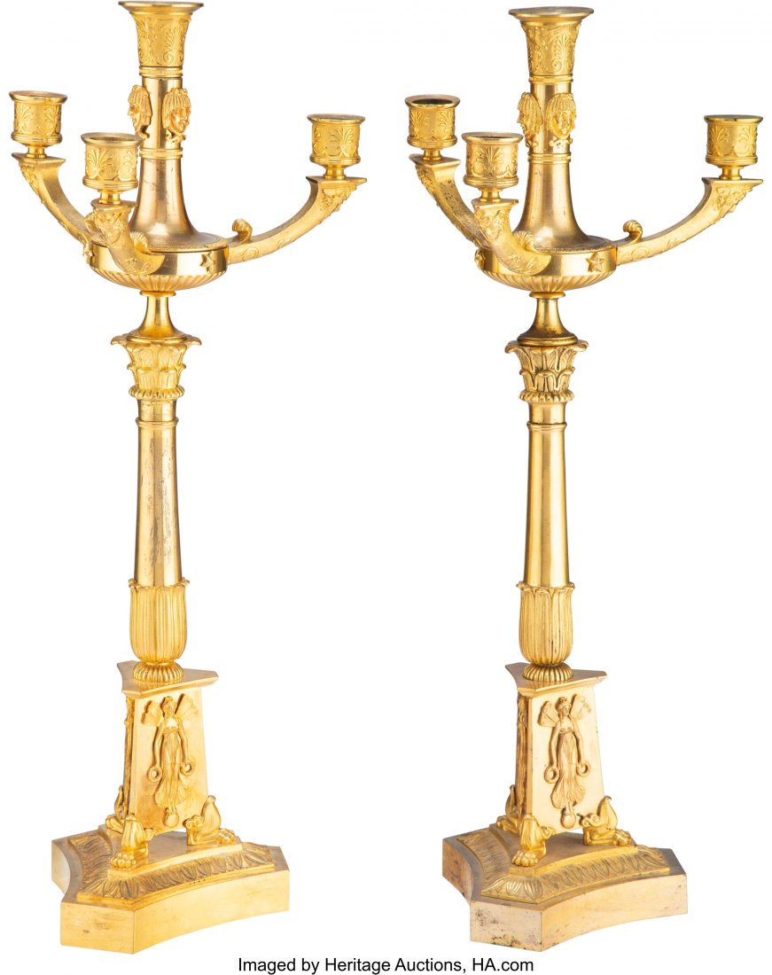 A Pair of French Empire Gilt Bronze Four-Light C: A Pair of French Empire Gilt Bronze Four-Light Candelabra, first quarter of the 19th century 21-1/2 x 8-1/2 x 8-1/2 inches (54.6 x 21.6 x 21.6 cm) (each) Property from the Collection of John Robert Cl