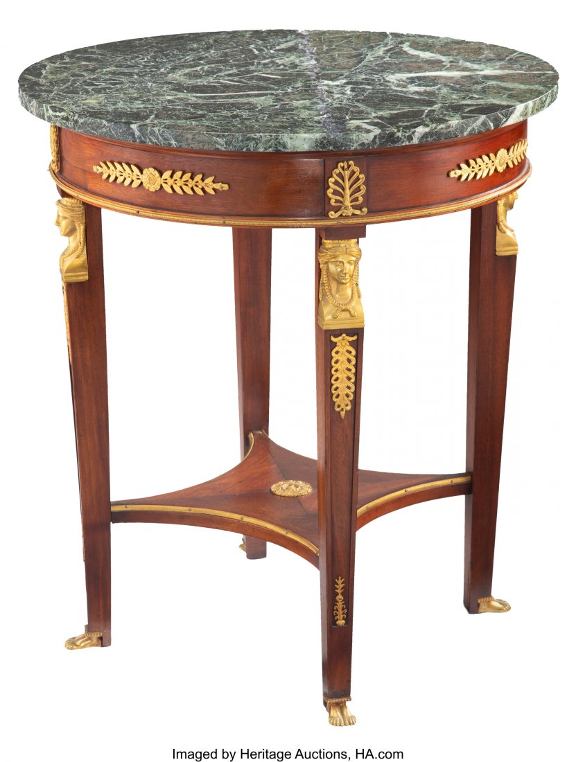 A French Empire-Style Gilt Metal Mounted Mahogan: A French Empire-Style Gilt Metal Mounted Mahogany Gueridon with Marble Top, 20th century 30-1/8 x 27 inches (76.5 x 68.6 cm) Property from the Collection of John Robert Clark PROVENANCE: Leslie Hindma