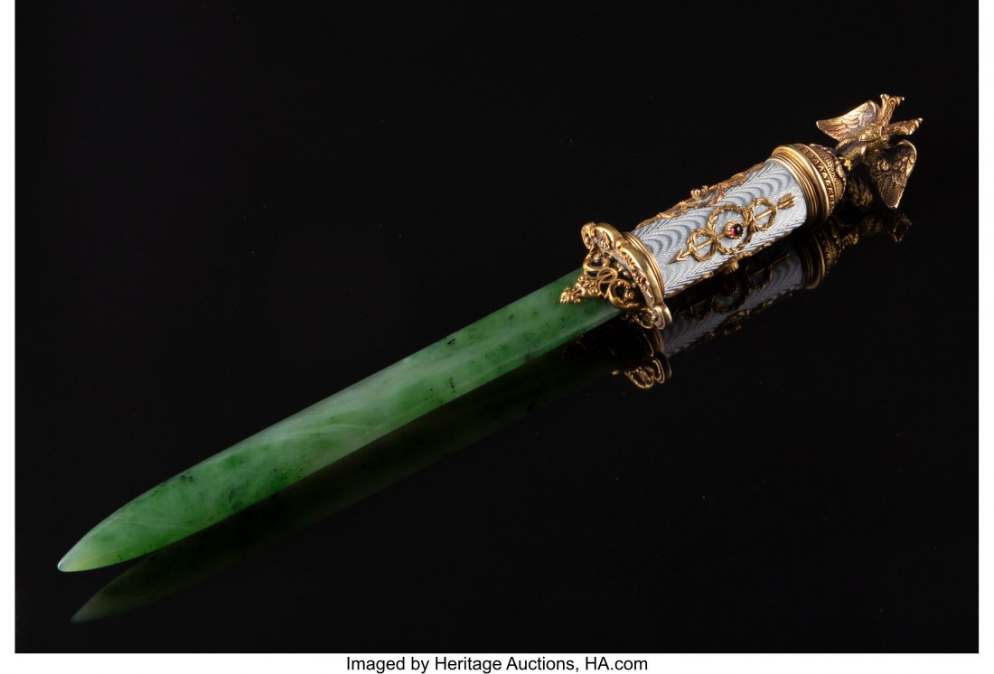 A Nephrite, Gilt Silver, and Guilloché Enamel L: A Nephrite, Gilt Silver, and Guilloché Enamel Letter Opener in the Manner of Fabergé, late 20th century 10-1/4 inches (26.0 cm) 4.8 ounces (gross) The letter opener housed in a fitted bo