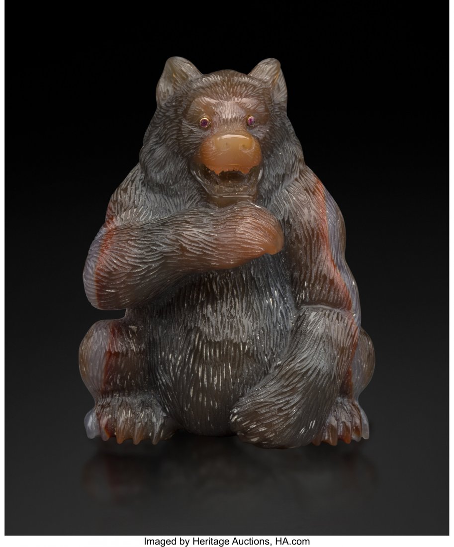 A Carved Agate Ruby-Mounted Bear in the Manner o: A Carved Agate Ruby-Mounted Bear in the Manner of Fabergé, late 20th century 3 x 2-3/8 x 2-1/8 inches (7.6 x 6.0 x 5.4 cm) 8.7 ounces (gross) The carved agate bear, housed in a fitted wooden bo