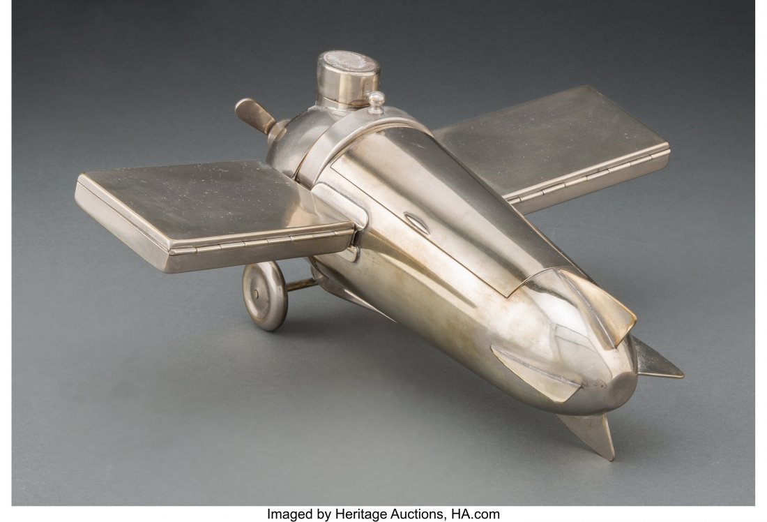J.A. Henckels (German, ) Airplane-Form Smoker's
