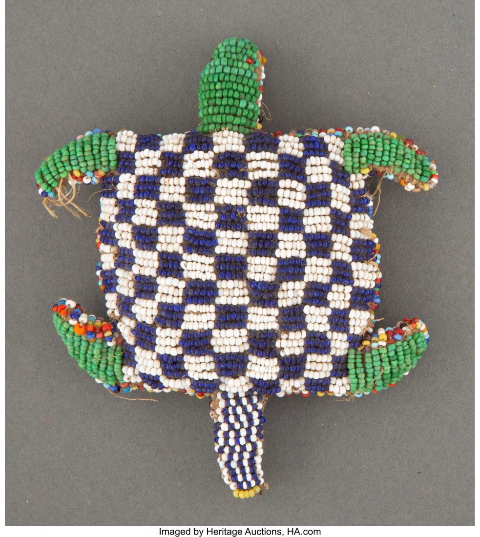 A Sioux Beaded Hide Fetish  Length: 4 ¾ inches (1 of 2)