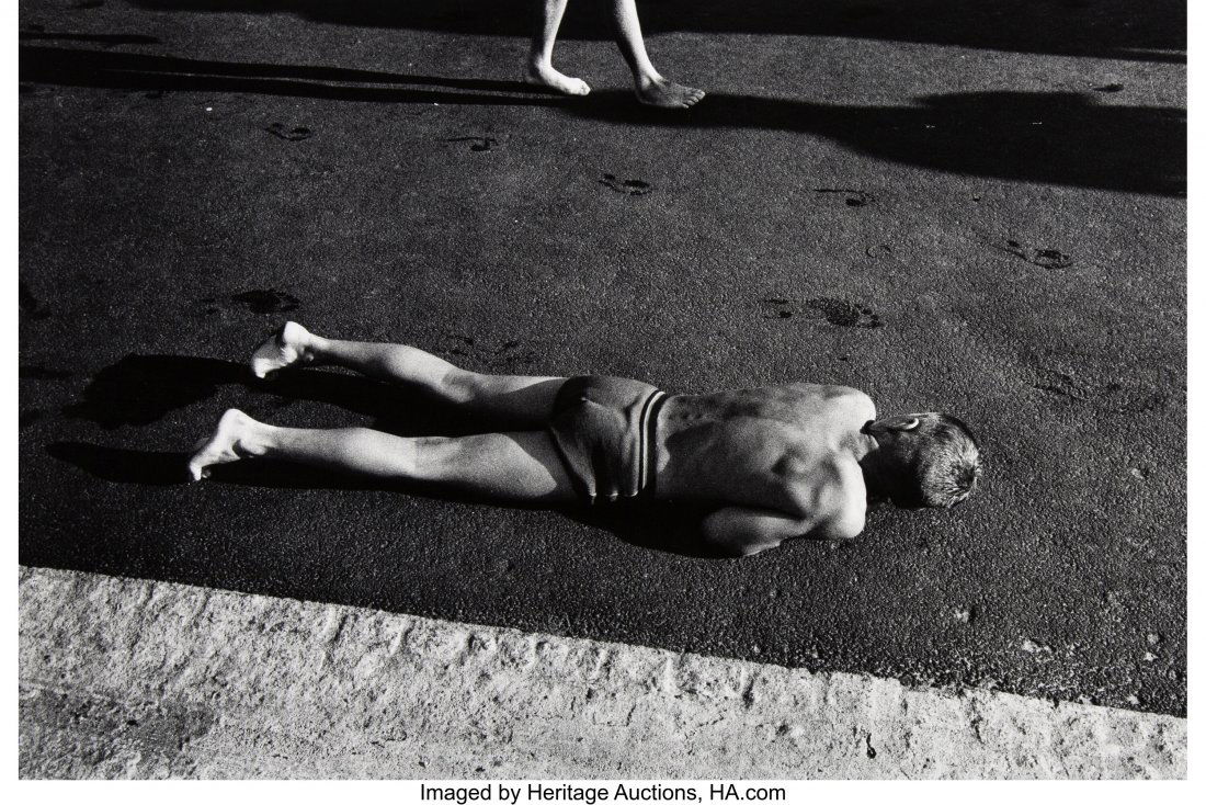 Will McBride (American, 1931-2015) Boy Warming H: Will McBride (American, 1931-2015) Boy Warming His Stomach on Asphalt, Berlin, 1956 Gelatin silver, printed 1992 15 x 22-1/8 inches (38.1 x 56.2 cm) Signed, titled, and dated in pencil, verso. HID0310