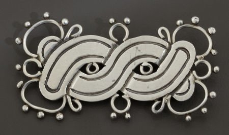 A MEXICAN SILVER BROOCH William Spratling, Taxco: A MEXICAN SILVER BROOCH William Spratling, Taxco, Mexico, circa 1940 Marks: WS