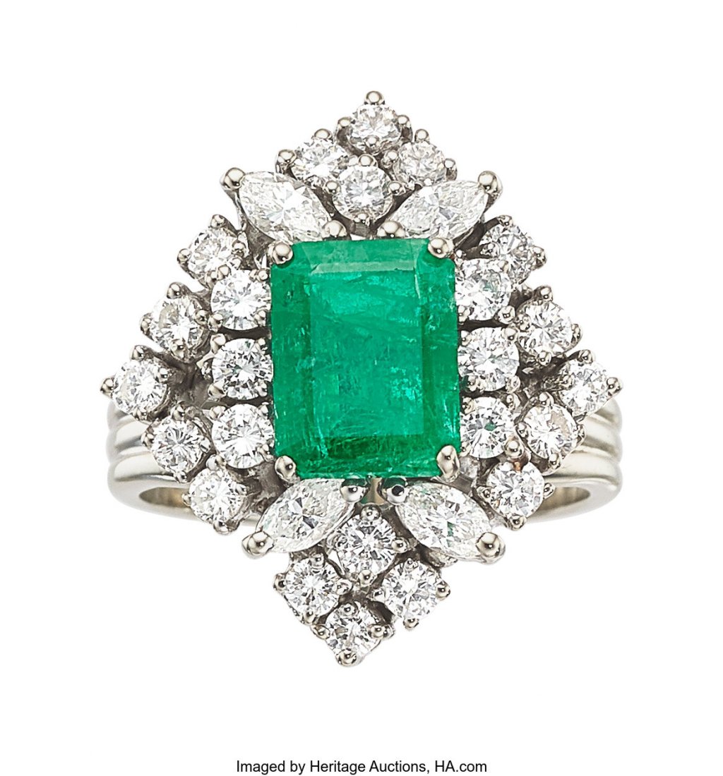 An Emerald, Diamond, and White Gold Ring Stones (1 of 2)