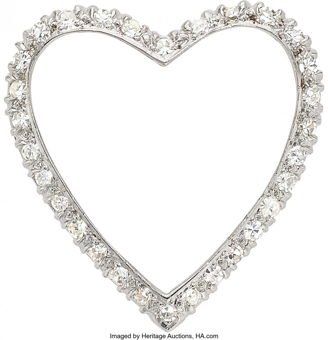 A Diamond and Platinum Pendant-Brooch Stones: Si (1 of 2)