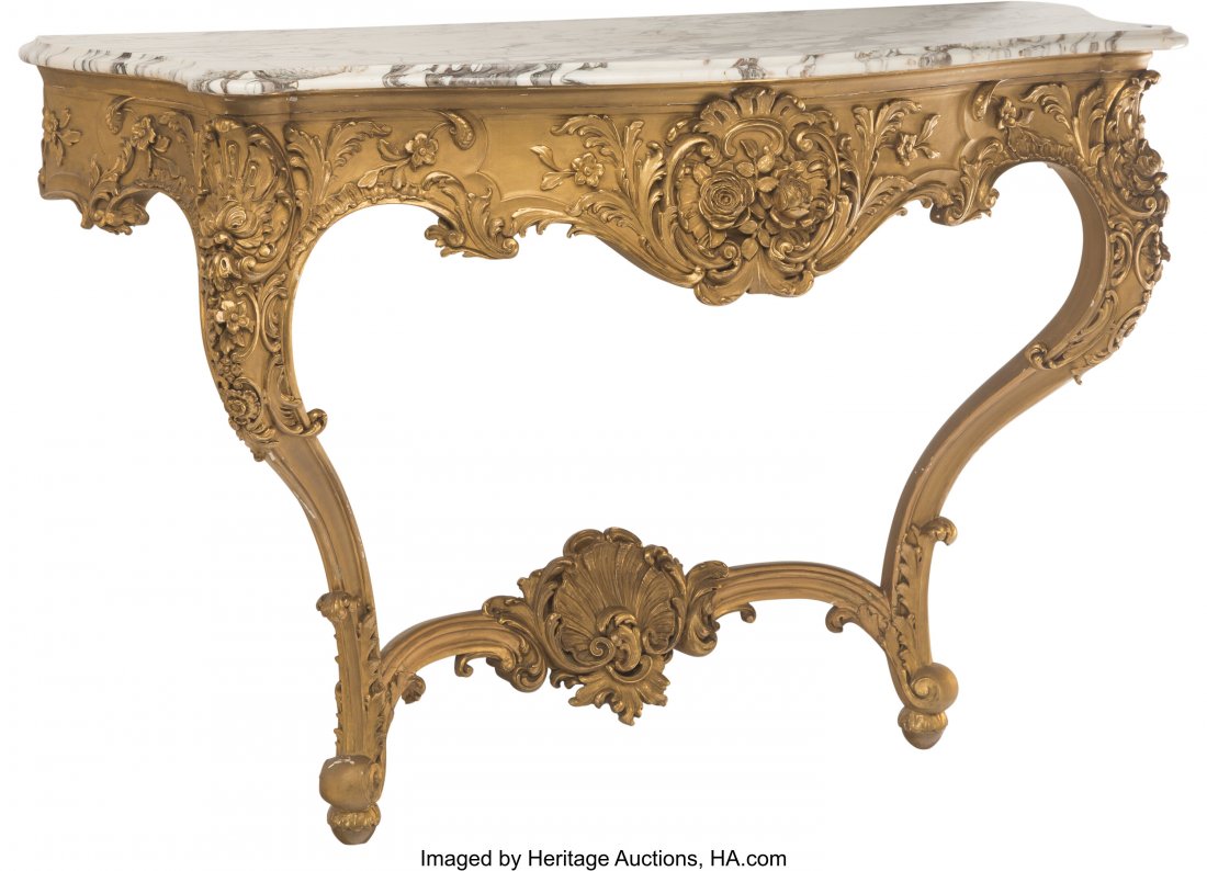 A Pair of French Louis XV-Style Giltwood Console: A Pair of French Louis XV-Style Giltwood Console Tables with Marble Tops 34 x 50 x 20-1/2 inches (86.4 x 127 x 52.1 cm) (each) HID03101062020 © 2020 Heritage Auctions | All Rights Reserved