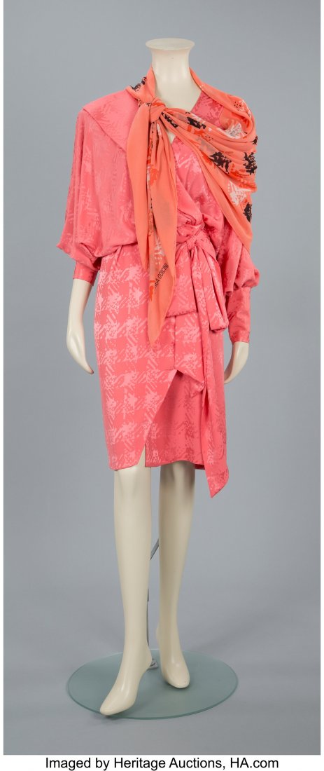 An Andrea Odicini Orange Silk Dress with Scarf L: An Andrea Odicini Orange Silk Dress with Scarf Label to dress: ODICINI COUTURE Size: 4-6 IMPORTANT NOTE: All of the clothing, shoes, handbags, hats, and jewelry lots in this auction will be sold AS IS