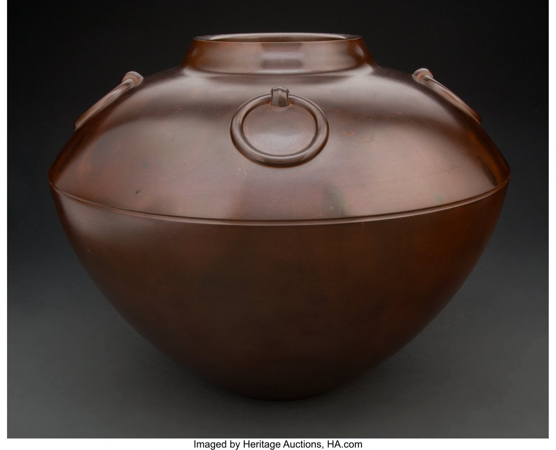 A Japanese Patinated Bronze Pot in Wooden Case M: A Japanese Patinated Bronze Pot in Wooden Case Marks: (artist's seal) 12-1/4 x 16 x 16 inches (31.1 x 40.6 x 40.6 cm) (pot) 14-1/2 x 17 x 17 inches (36.8 x 43.2 x 43.2 cm) (case) HID03101062020 ©