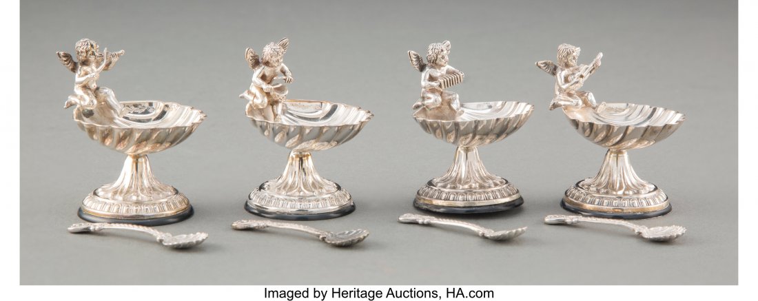 A Set of Four Pedro Duran Silver Cherub Musician: A Set of Four Pedro Duran Silver Cherub Musicians Salt Cellars with Spoons, Madrid Marks: Pedro Duran, (crown over F), 925 STERLING, (various) 2 x 1-5/8 x 1-5/8 inches (5.1 x 4.1 x 4.1 cm) (cellar) 4.