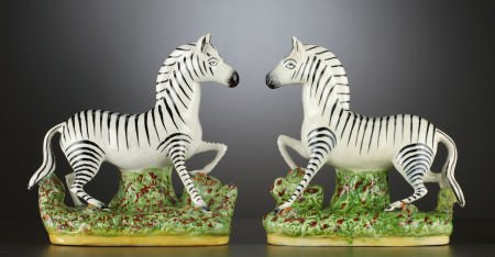 A PAIR OF ENGLISH CERAMIC FIGURAL ZEBRAS Attrib: A PAIR OF ENGLISH CERAMIC FIGURAL ZEBRAS Attributed to Shorter & Son, Stoke-on-Trent,