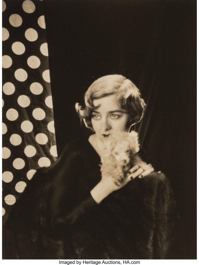 Cecil Beaton (British, 1904-1980) Nancy Cunard w: Cecil Beaton (British, 1904-1980) Nancy Cunard with Dog, 1929 Gelatin silver print 12-3/8 x 9-1/4 inches (31.4 x 23.5 cm) (image/sheet) Signed in red conté crayon, mount recto. HID03101062020 &