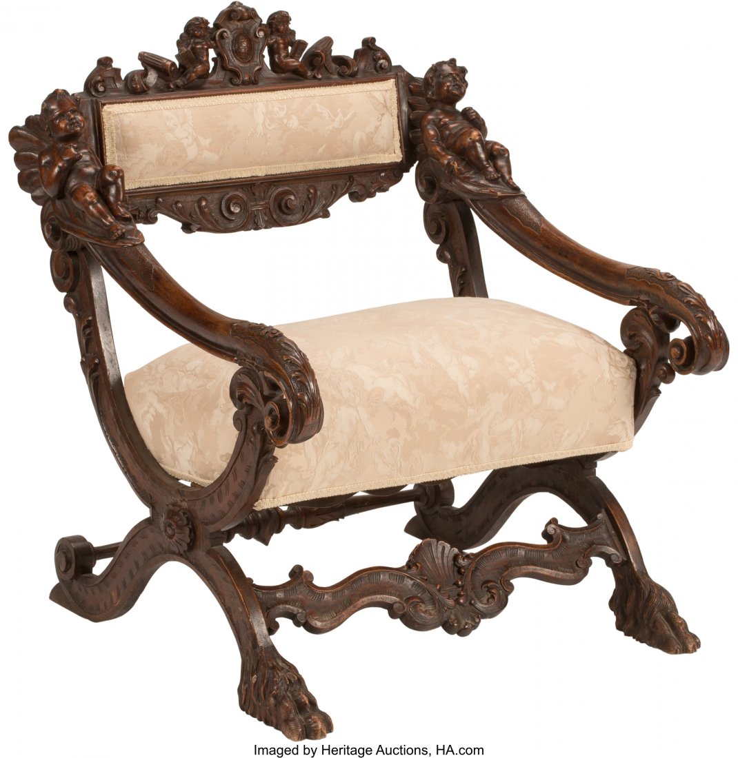 A Continental Renaissance Revival Carved Figural: A Continental Renaissance Revival Carved Figural Chair, 19th century 33 x 27-1/2 x 28 inches (83.8 x 69.9 x 71.1 cm) HID03101062020 © 2020 Heritage Auctions | All Rights Reserved
