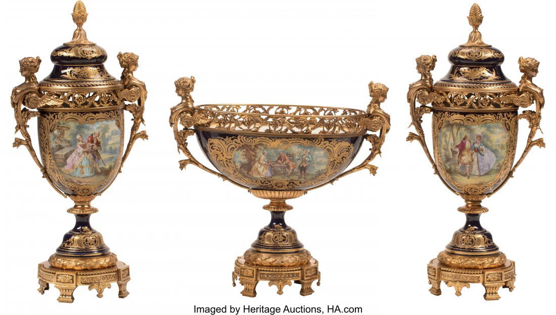 A Three-Piece French Sèvres-Style Covered Porce: A Three-Piece French Sèvres-Style Covered Porcelain Garniture with Gilt Bronze Mounts, 19th century Marks: (crossed L's), T, (pellet) 21-1/2 x 22 x 11-1/2 inches (54.6 x 55.9 x 29.2 cm) (talles