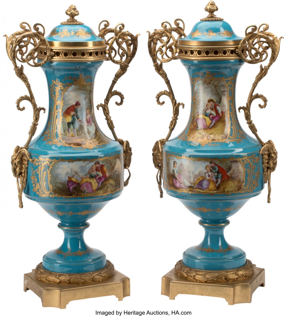 A Pair of Sèvres Porcelain Gilt Bronze Mounted: A Pair of Sèvres Porcelain Gilt Bronze Mounted Urns, 19th century Marks: (crossed Ls-L) 25 x 10-1/2 x 8-1/2 inches (63.5 x 26.7 x 21.6 cm) (each) HID03101062020 © 2020 Heritage Auctions |